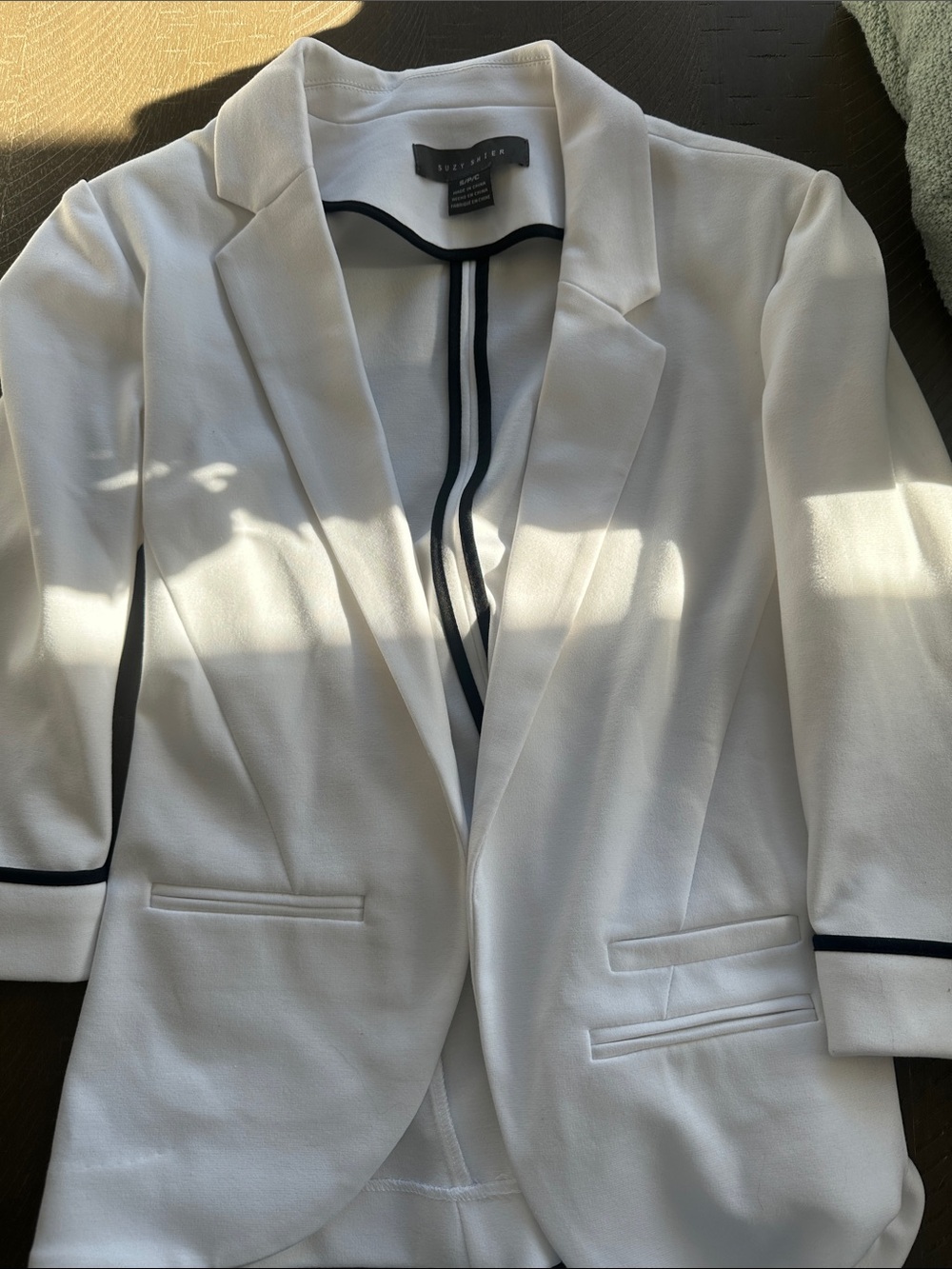 White Blazer with Black Trim